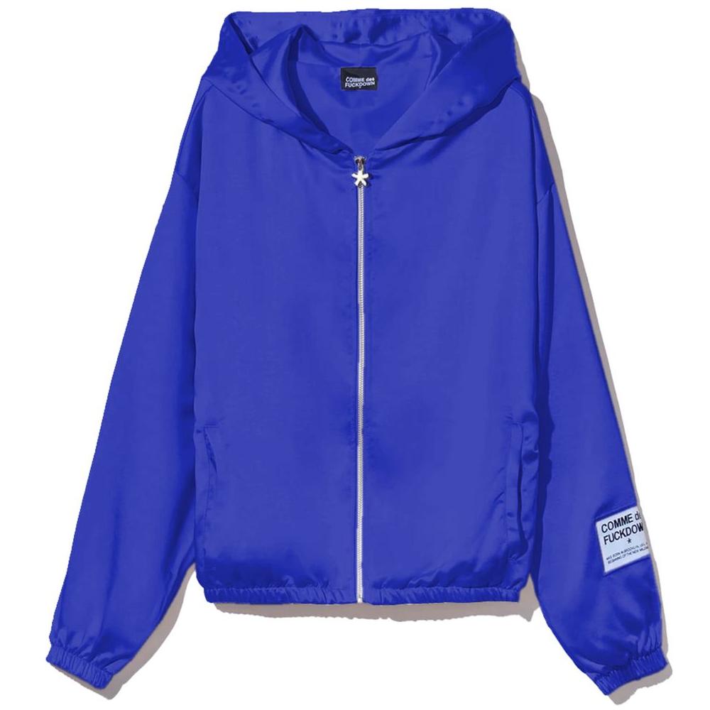 Blue satin Comme Des Fuckdown jacket with zipper, hood, and logo label on sleeve, features two side pockets.