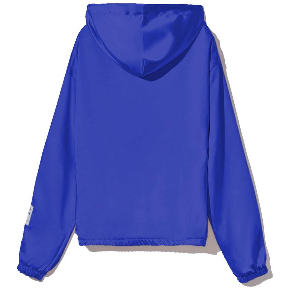 Back view of Comme Des Fuckdown blue polyester sweater with hood and logo label on sleeve.
