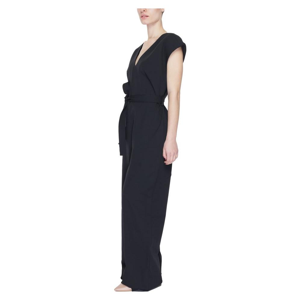 Women's black elegant jumpsuit, Vila Clothes spring/summer collection, 90% polyester, showcasing side view and belted waist design