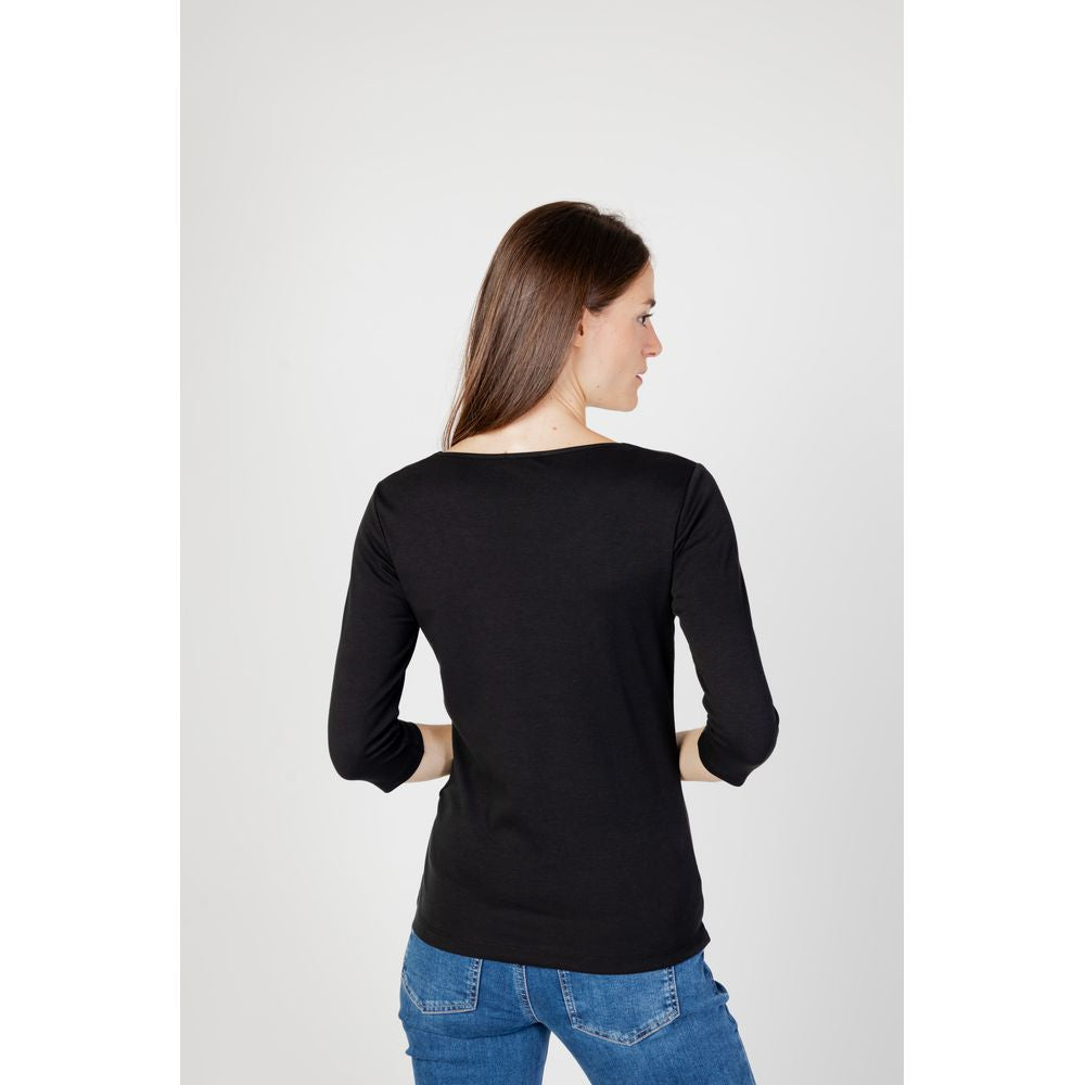 Woman wearing Street One black long sleeve cotton-modal t-shirt, back view. Autumn/Winter collection.