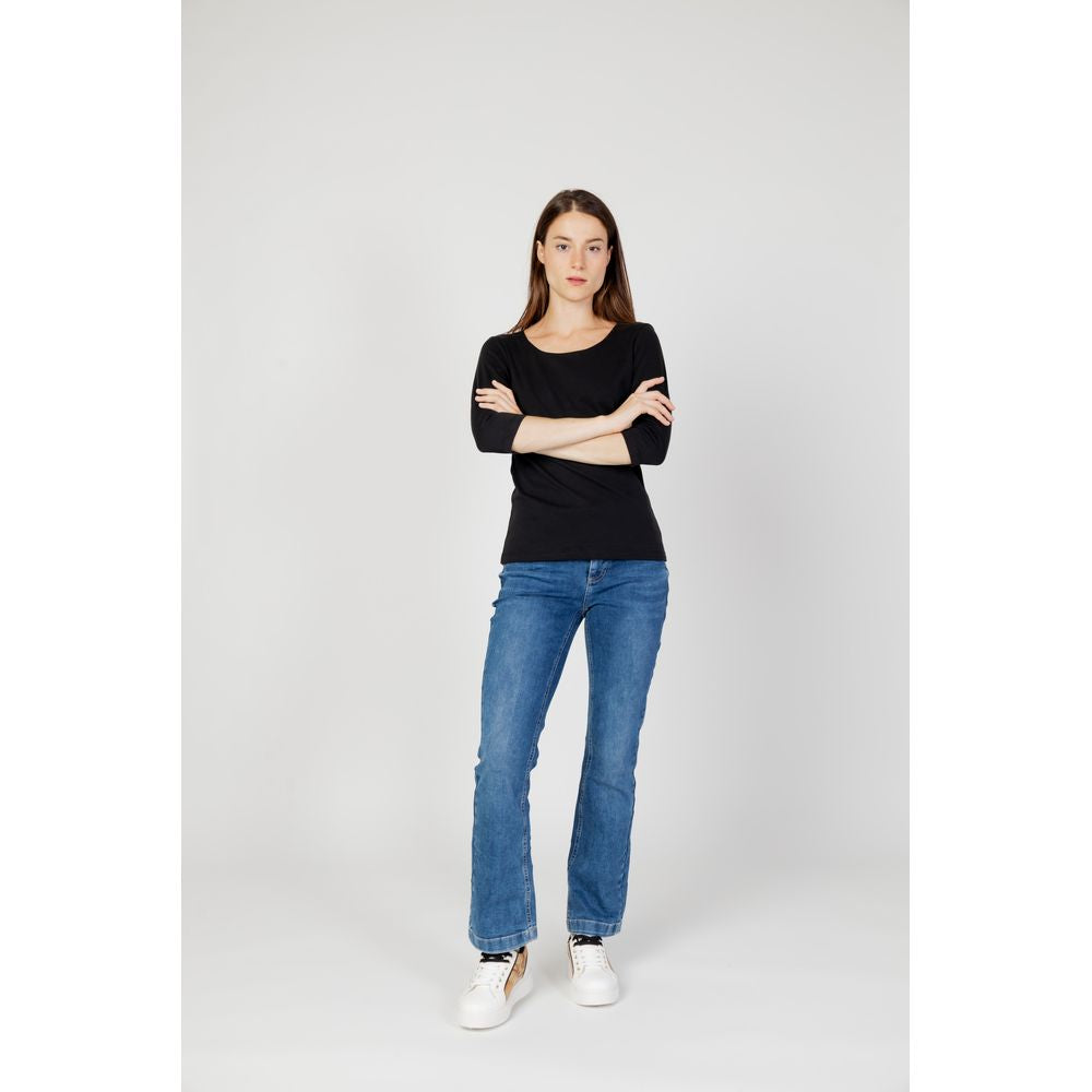 Woman wearing Street One black long sleeve cotton-modal top, autumn/winter collection, styled with blue jeans.