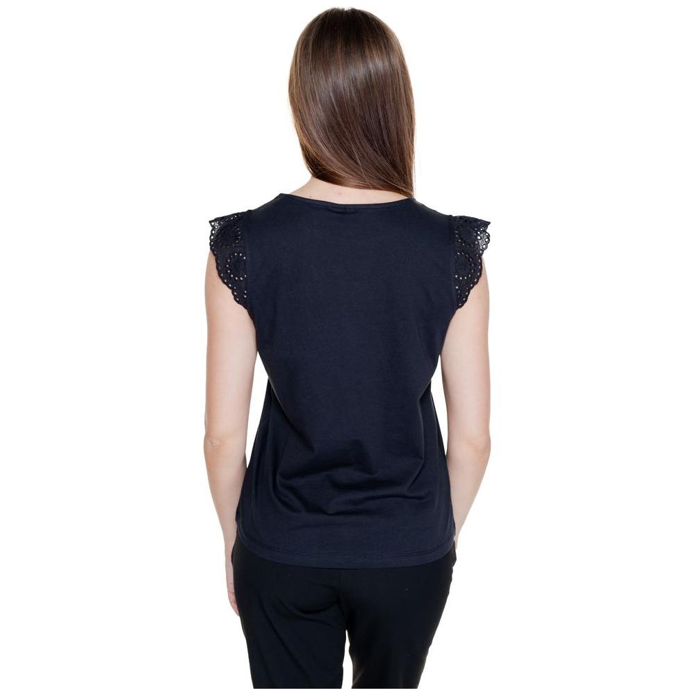 Back view of a woman wearing a Vero Moda black recycled cotton top with lace shoulder details, part of the spring/summer collection.