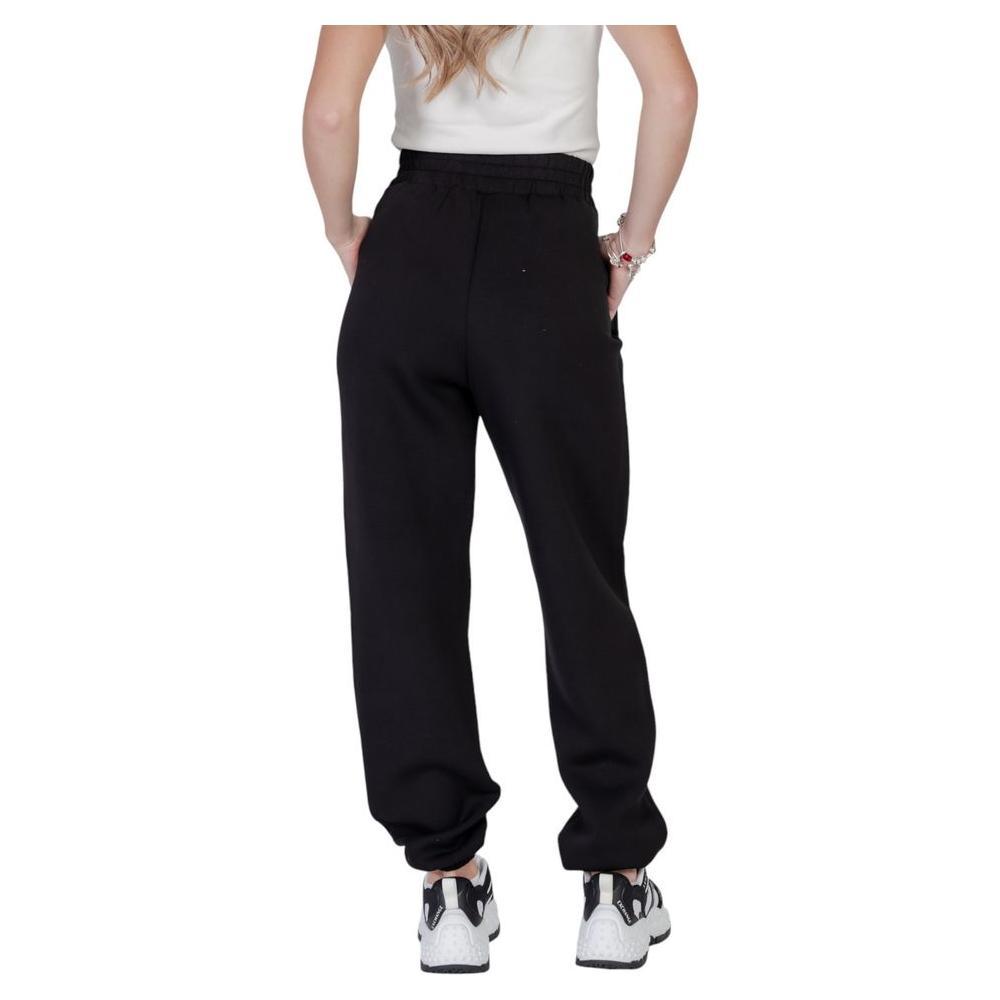 Back view of Guess Active Cecilia Scuba Jogger in black, showcasing elastic waistband and comfortable fit for women's casual fashion.