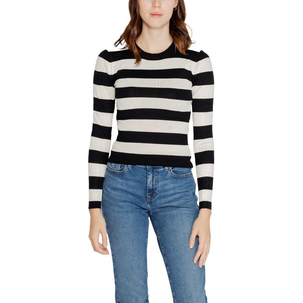 Woman wearing Jacqueline De Yong black and white striped viscose top, part of fall/winter collection.