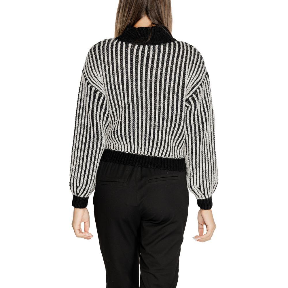 Back view of Jacqueline De Yong black polyester sweater, women's fall/winter knitwear, featuring striped pattern.