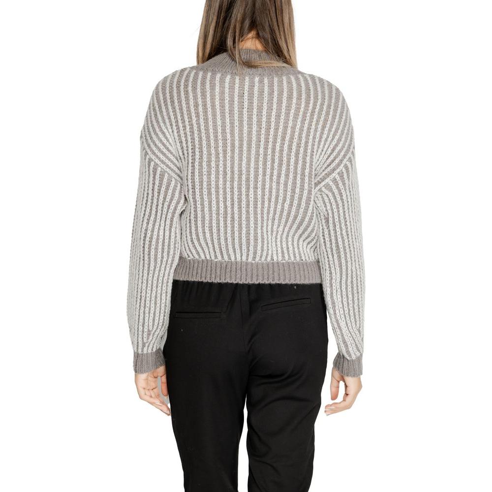 Back view of a Jacqueline De Yong gray striped polyester sweater, women's knitwear for fall/winter, featuring recycled materials.
