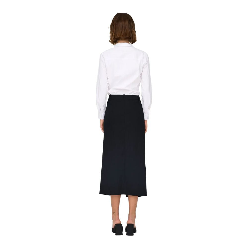 Back view of woman wearing Jacqueline De Yong gray polyester skirt with white shirt, fall/winter collection.