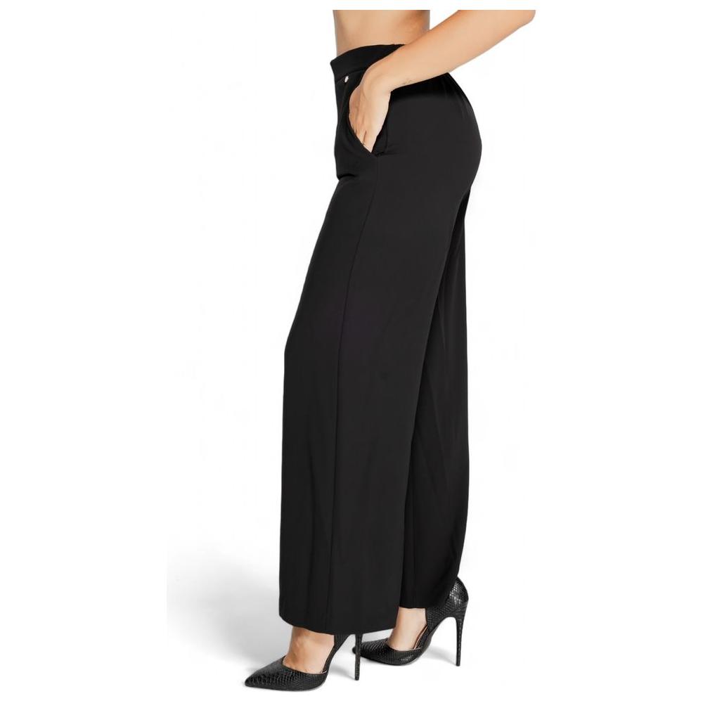 Rinascimento women's black polyester pants, fall/winter collection, featuring a stylish design with comfortable fit and side pockets.