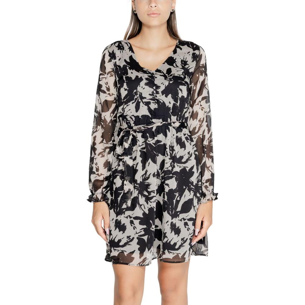 Jacqueline De Yong black recycled polyester dress for women, fall/winter collection, showcasing floral print and sheer long sleeves.