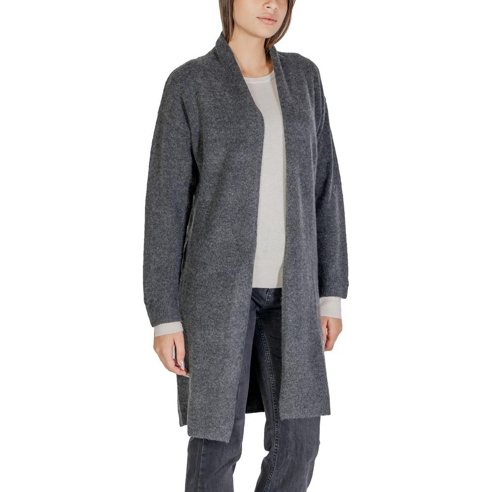 Woman wearing Morgan De Toi gray polyester cardigan for fall and winter fashion.