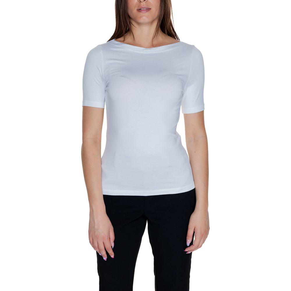 Woman wearing Vero Moda white viscose short-sleeve t-shirt, minimalist design, paired with black pants, perfect for casual or elegant outfits.
