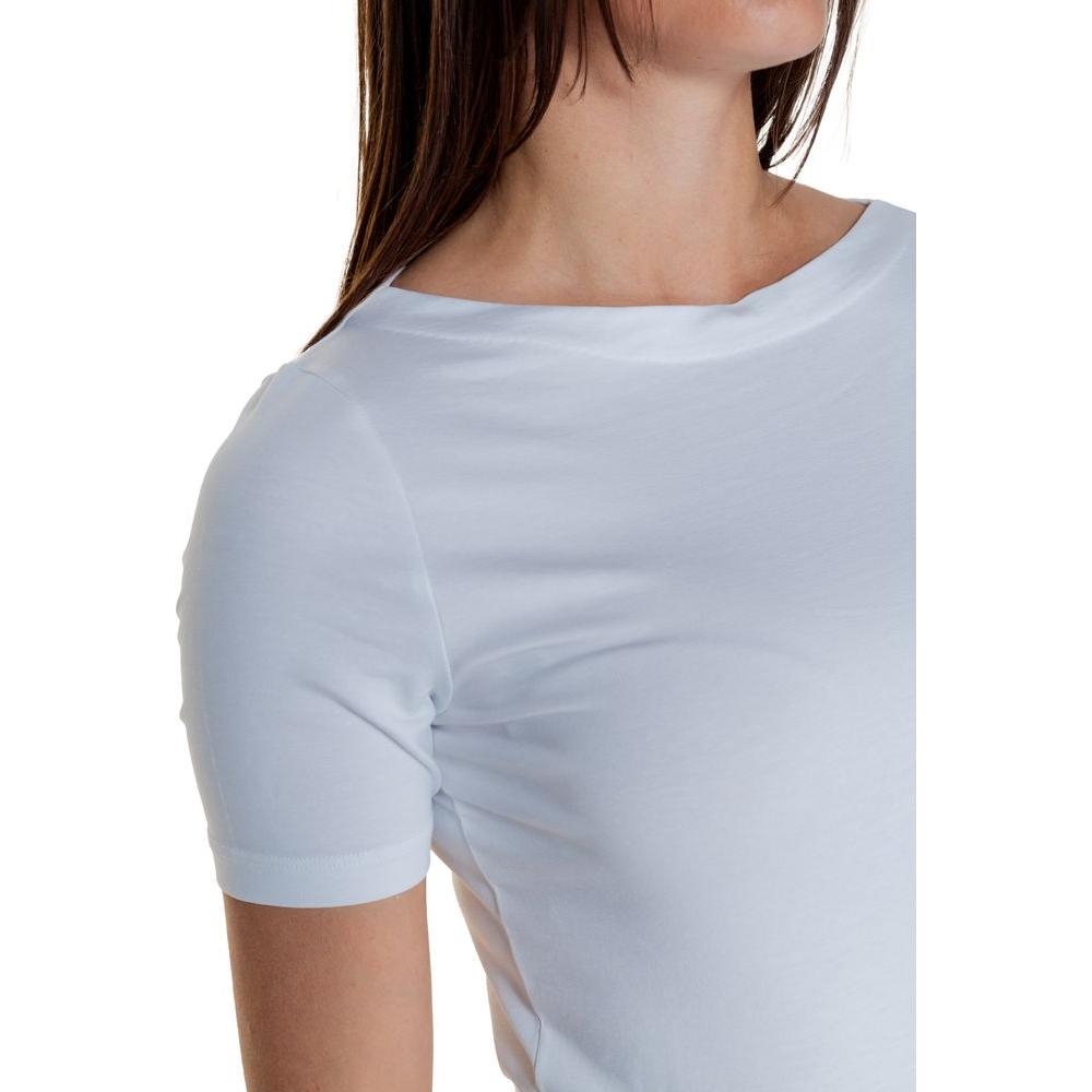 Woman wearing Vero Moda white viscose short-sleeve t-shirt showcasing minimalist design.