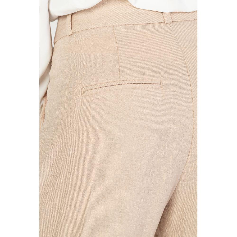 Vero Moda pink viscose palazzo trousers for women, featuring a blend of 81% viscose and 19% nylon, perfect for spring/summer fashion.