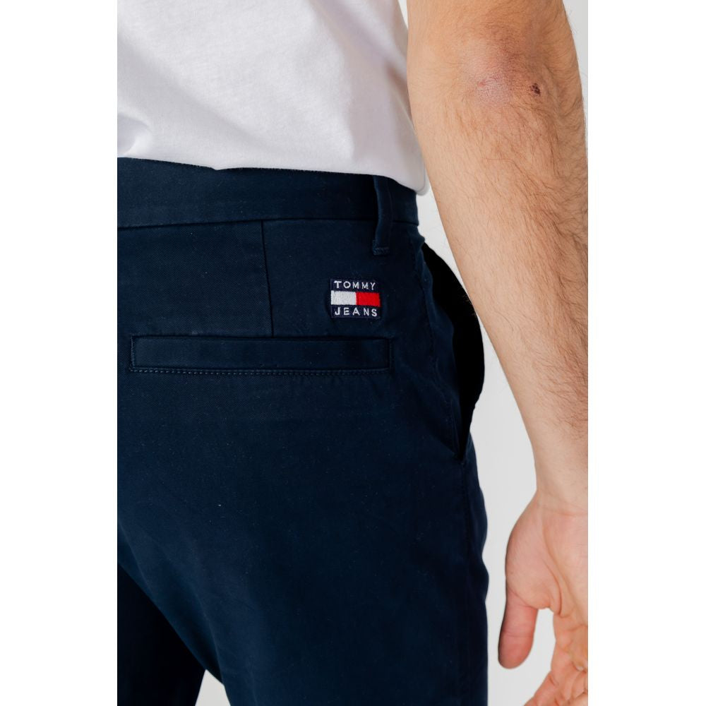 Tommy Hilfiger men's blue organic cotton tapered jeans, rear view with brand logo, part of spring/summer collection