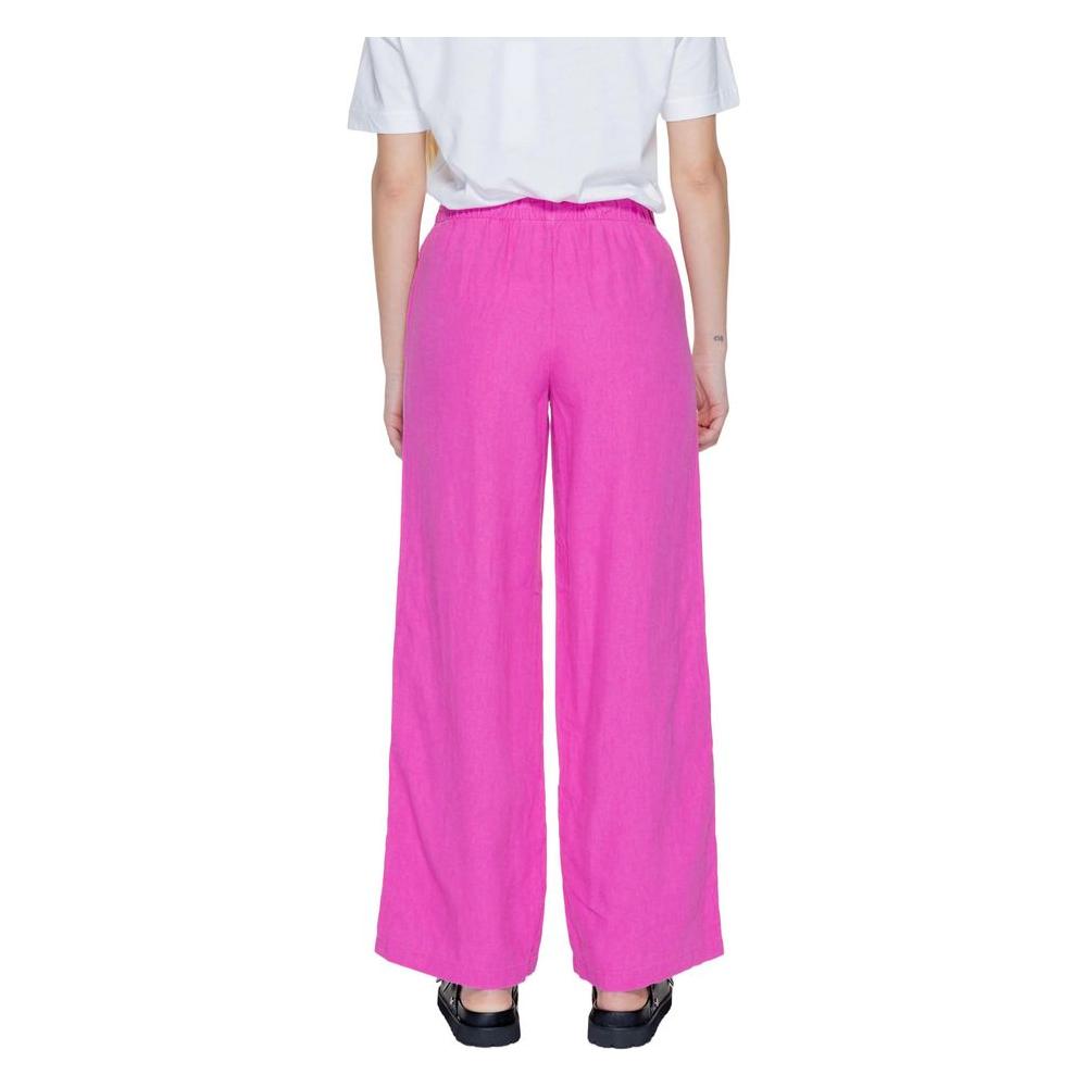 Back view of women's pink linen palazzo trousers, perfect for spring/summer collection, made of 55% linen and 45% viscose.