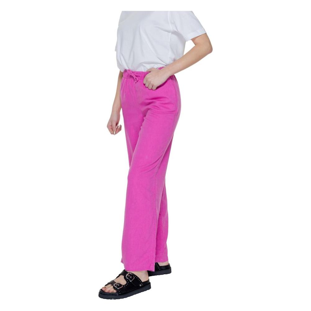 Women's pink linen palazzo trousers from spring/summer collection, featuring a blend of 55% linen and 45% viscose.