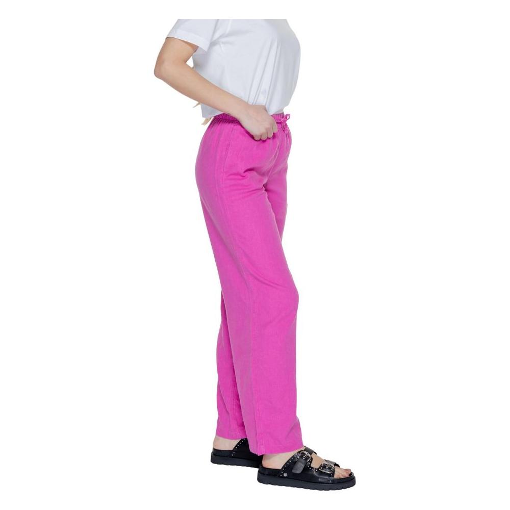 Women's pink linen palazzo trousers, spring/summer collection, featuring 55% linen and 45% viscose composition.