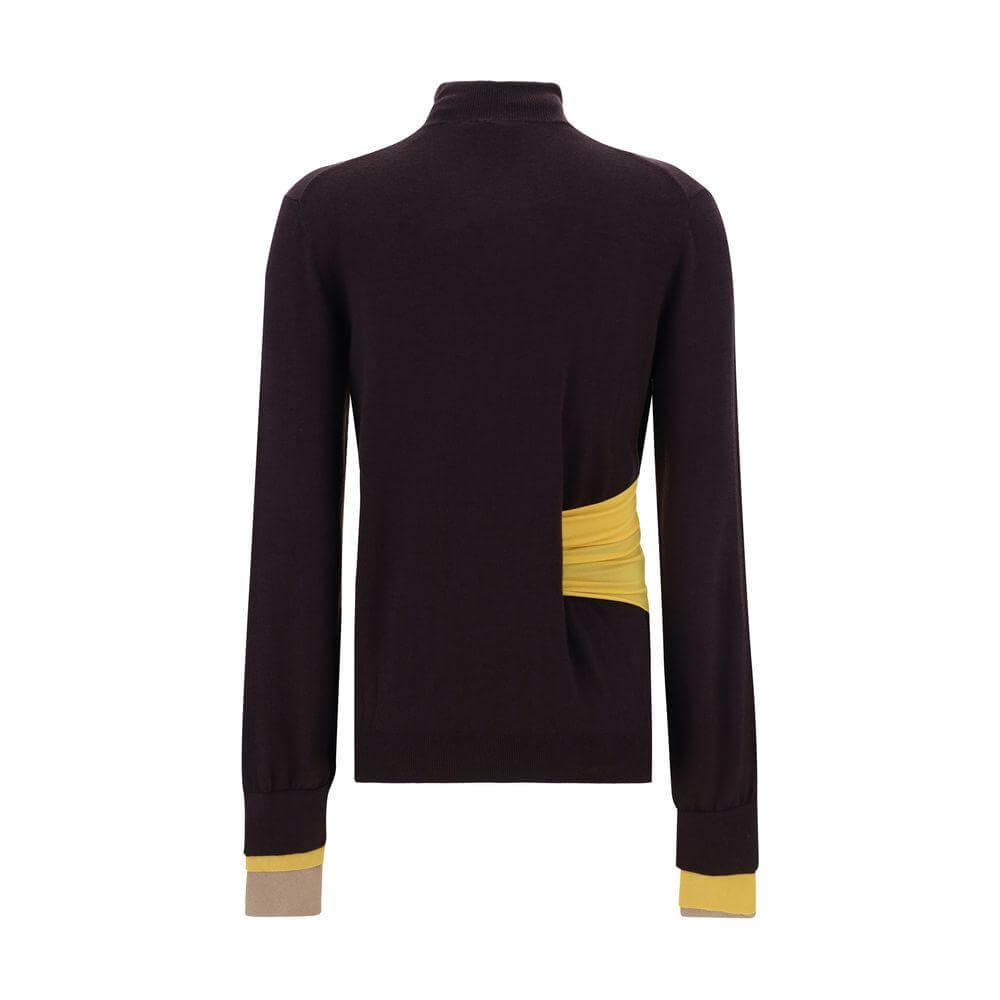 Back view of Fendi wool turtleneck sweater with ribbed high neck and unique trompe l’oeil effect on cuff, featuring a fitted waistband.