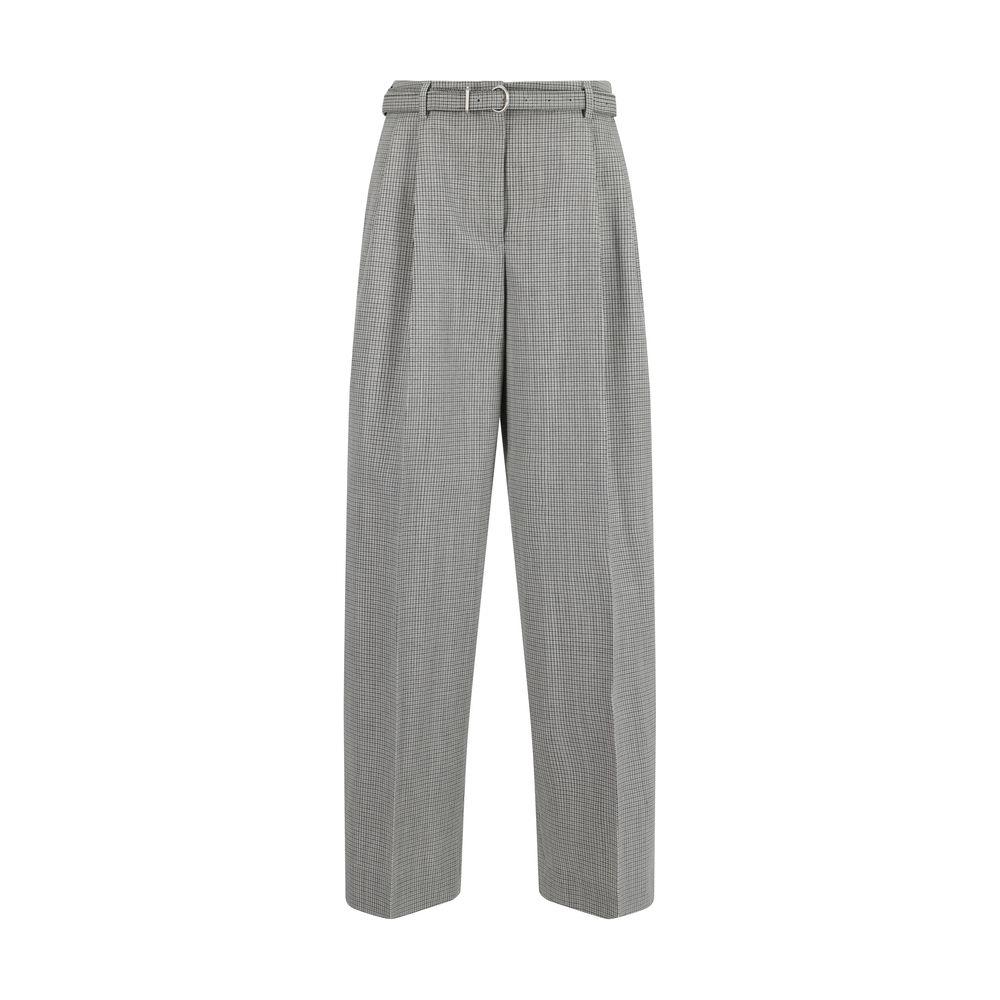 Jil Sander virgin wool wide-leg pants with belt, featuring button-and-zip closure, side slash pockets, and adjustable fit.
