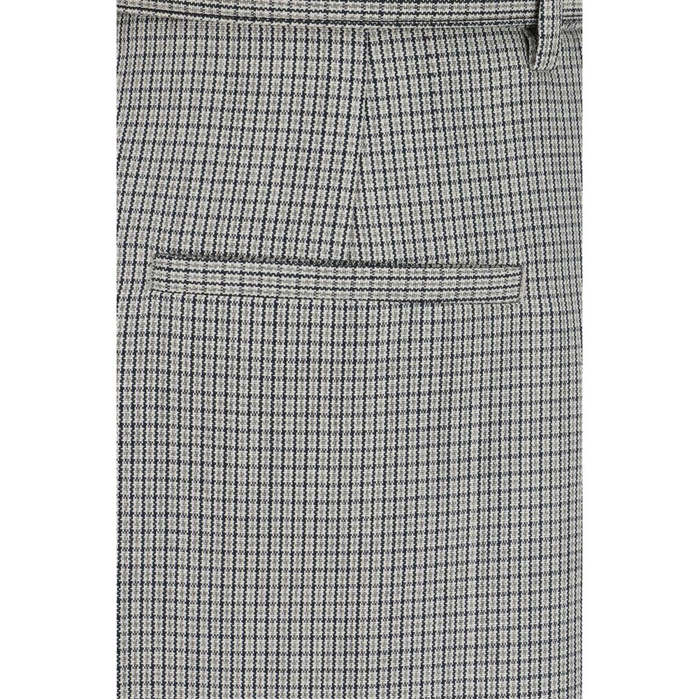 Jil Sander virgin wool pants showcasing side pocket detail and textured pattern for a sophisticated, modern look.