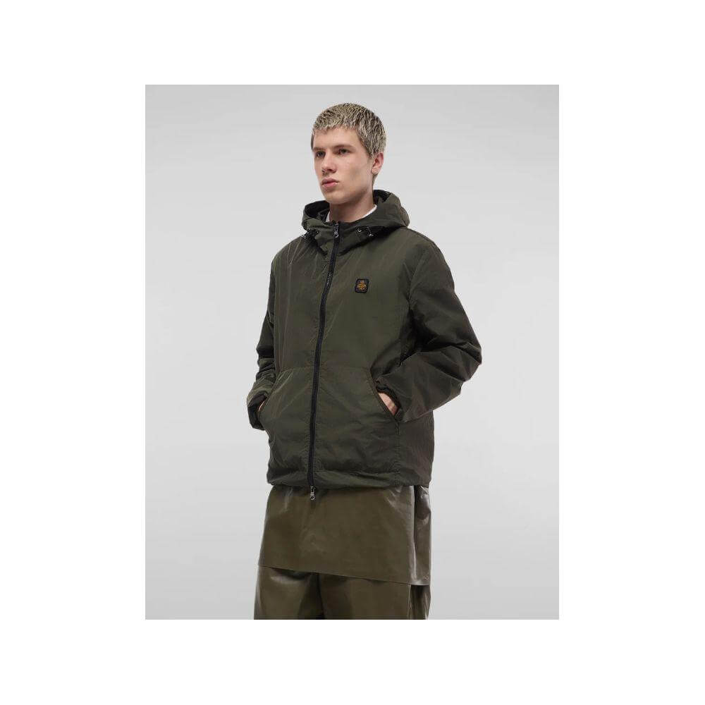 Refrigiwear green polyamide men's jacket with zipper closure and pockets, modeled for stylish, breathable summer wear.