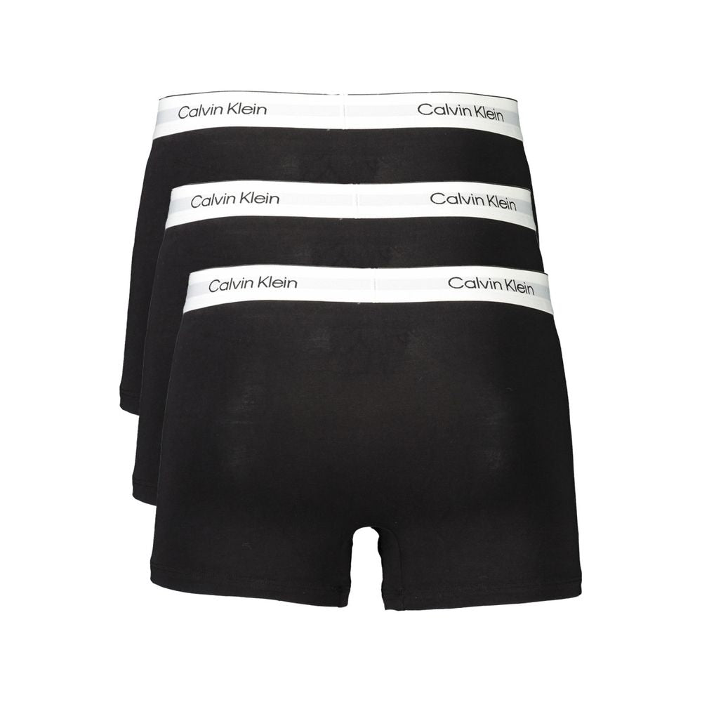 Calvin Klein black cotton men boxer shorts tri-pack with iconic elastic waistband, perfect fit and stretch, sleek and stylish.