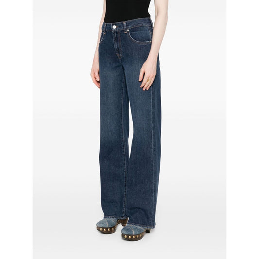 Alt Tag: Seven Jeans Blue wide-leg denim jeans with button fly and five-pocket design, featuring navy belt loops.