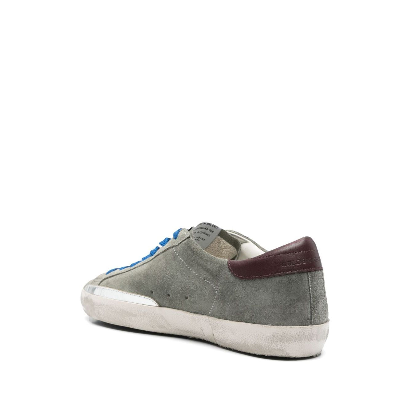 Golden Goose Super-Star sneakers in desert sage green, featuring front lace-up, padded ankle, removable insole, and rubber sole.