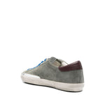 Golden Goose Super-Star sneakers in desert sage green, featuring front lace-up, padded ankle, removable insole, and rubber sole.