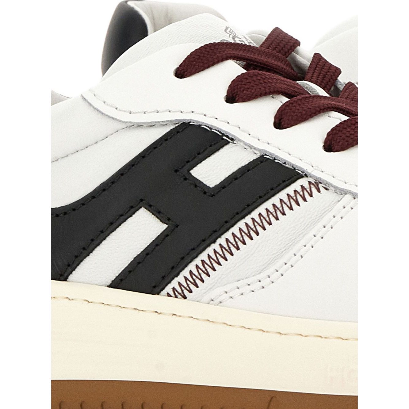Hogan Pre Sneakers Hogan H630 with white contrasting panels, lace-up fastening, suede detail, rubber sole, and perforated toe box