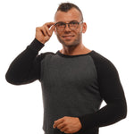Man wearing Ermenegildo Zegna Gray Men Glasses Frame, featuring titanium full-rim design with gray color, trapezium style, and demo lenses.