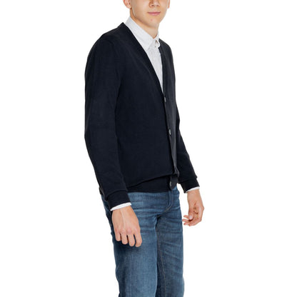Man wearing Jack Jones Black Cotton Cardigan with a white shirt and jeans, showcasing a casual yet smart outfit.