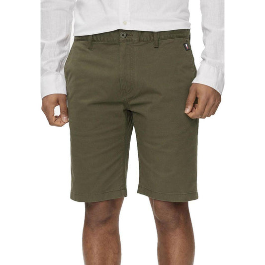Men's green organic cotton shorts by Tommy Hilfiger, part of the Spring/Summer collection, featuring 97% cotton and 3% elastane blend.
