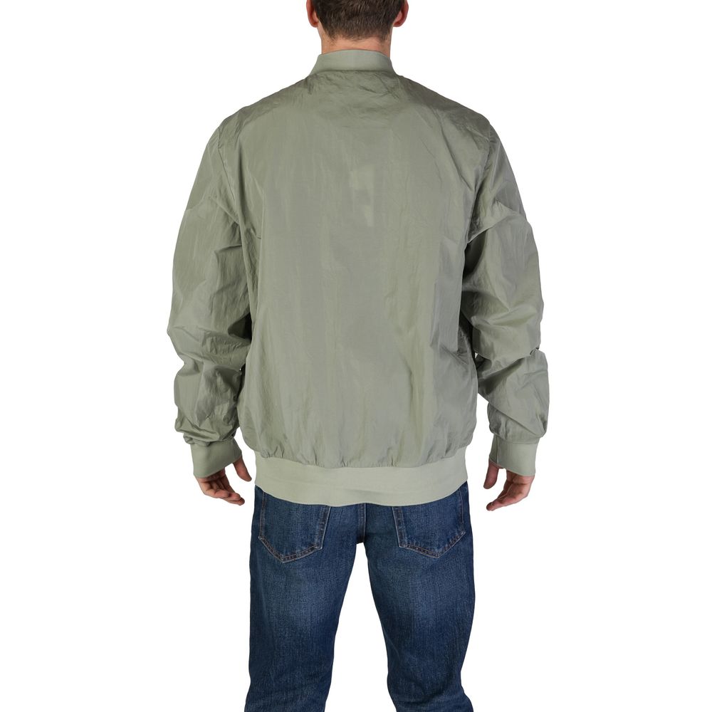 Front view with bag zipped and handles upright.