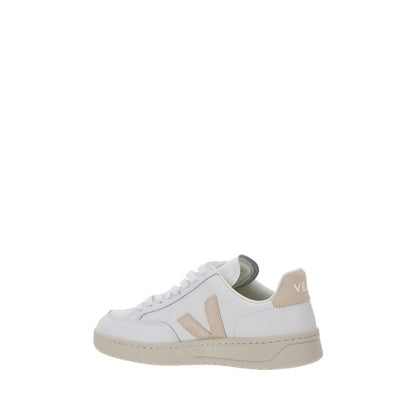 Veja White Rubber Low Top Sneakers, V-12 calfskin design with lace-up closure and iconic brand logo on side and heel, AW25 collection.