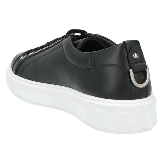 Les Hommes black calfskin men's sneaker with metal ring detail and white rubber sole, luxury Italian design.