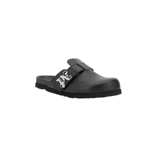 Palm Angels leather mules with round toe, slip-on design, wide strap, and iconic plaque logo for modern style and comfort.
