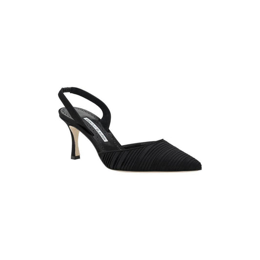 Black Manolo Blahnik Carolyne Pumps with sleek elongated toe, elastic slingback, and pleated front band design for refined elegance.