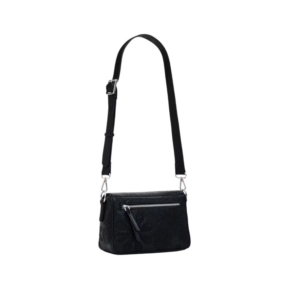 Front view with bag zipped and handles upright.
