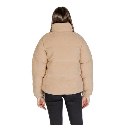 Back view of Columbia Beige Nylon Coat with soft Sherpa lining, ideal for cold weather comfort and style.
