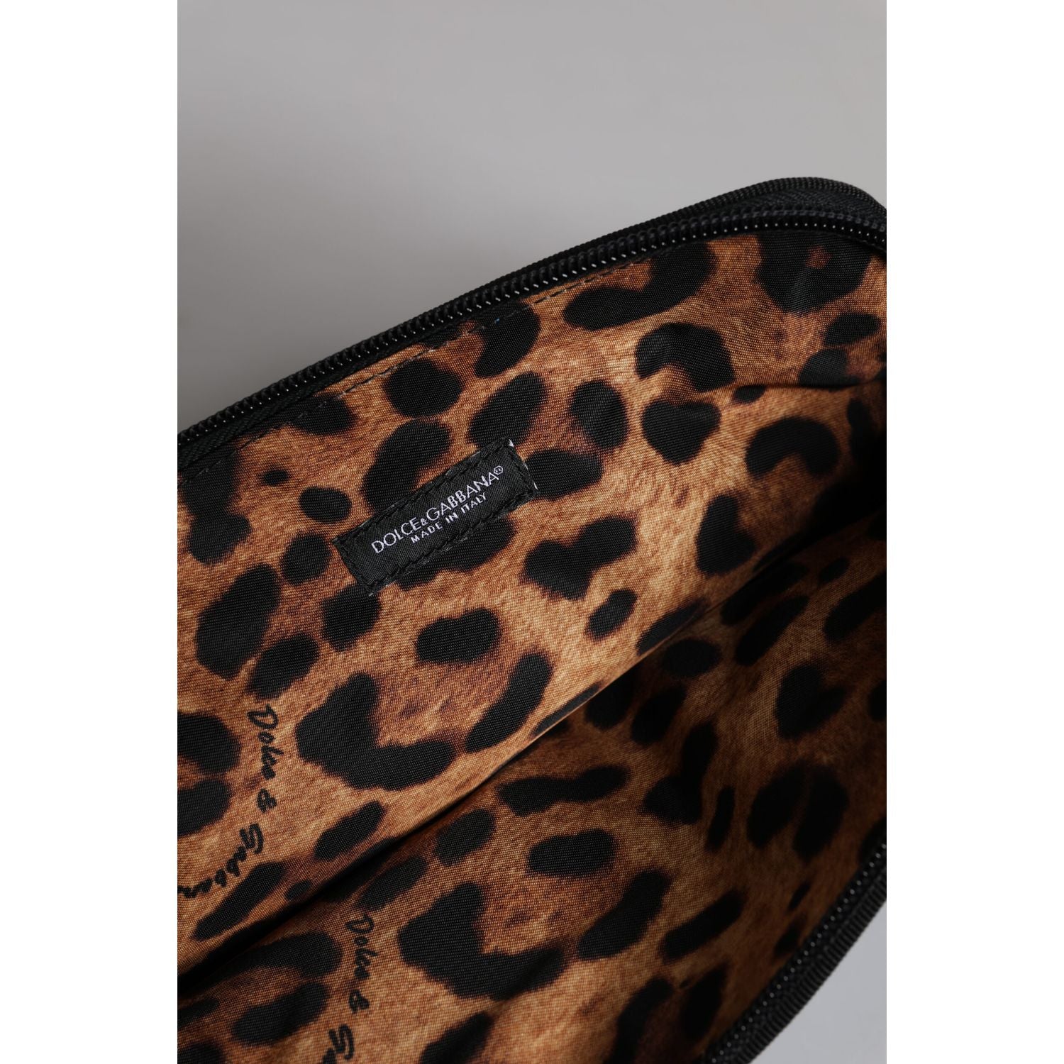 Front view with bag zipped and handles upright.