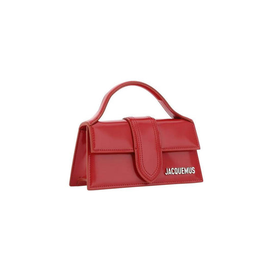 Jacquemus Le Bambino red handbag with flat top handle and adjustable shoulder strap, featuring iconic monogram on the front.