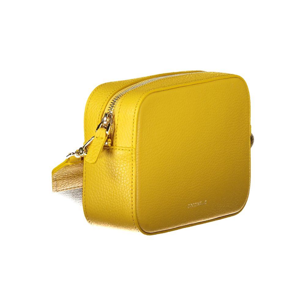 Coccinelle Yellow Leather Women Handbag with vibrant hues, luxury craftsmanship, and detachable shoulder strap for versatile styling.