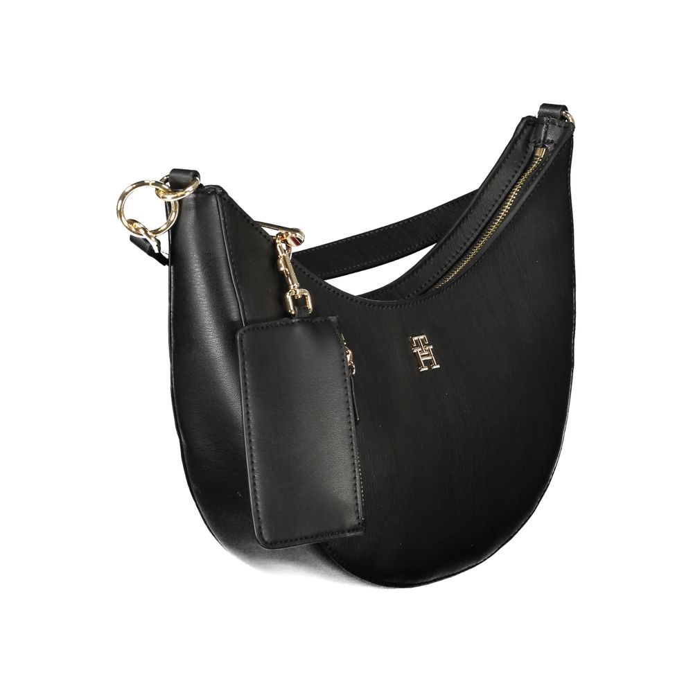 Front view with bag zipped and handles upright.