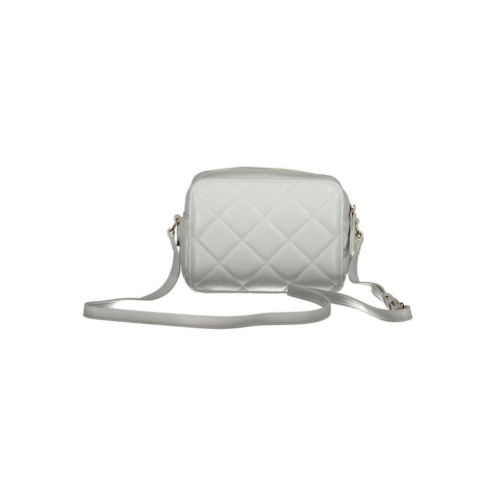 Front view with bag zipped and handles upright.