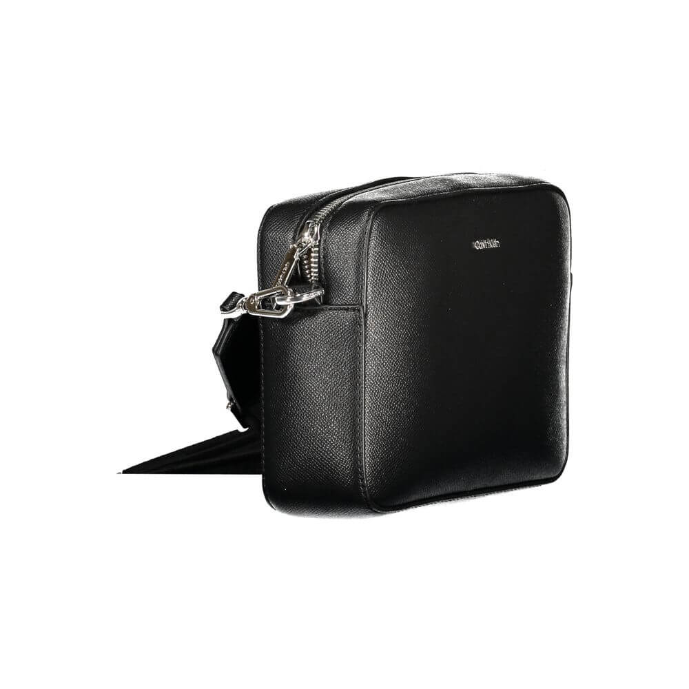Front view with bag zipped and handles upright.