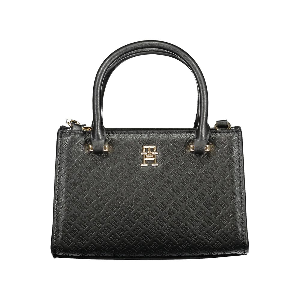 Front view with bag zipped and handles upright.