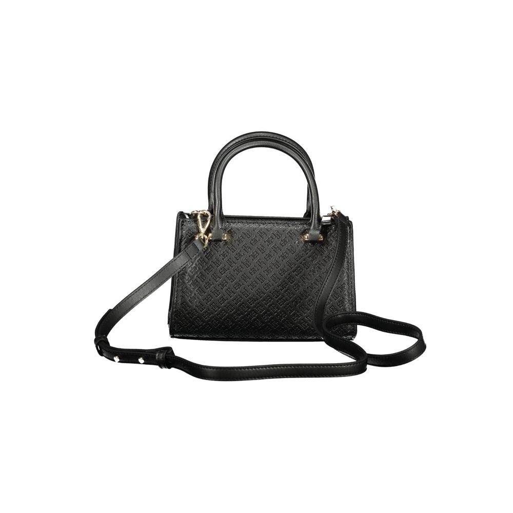 Front view with bag zipped and handles upright.
