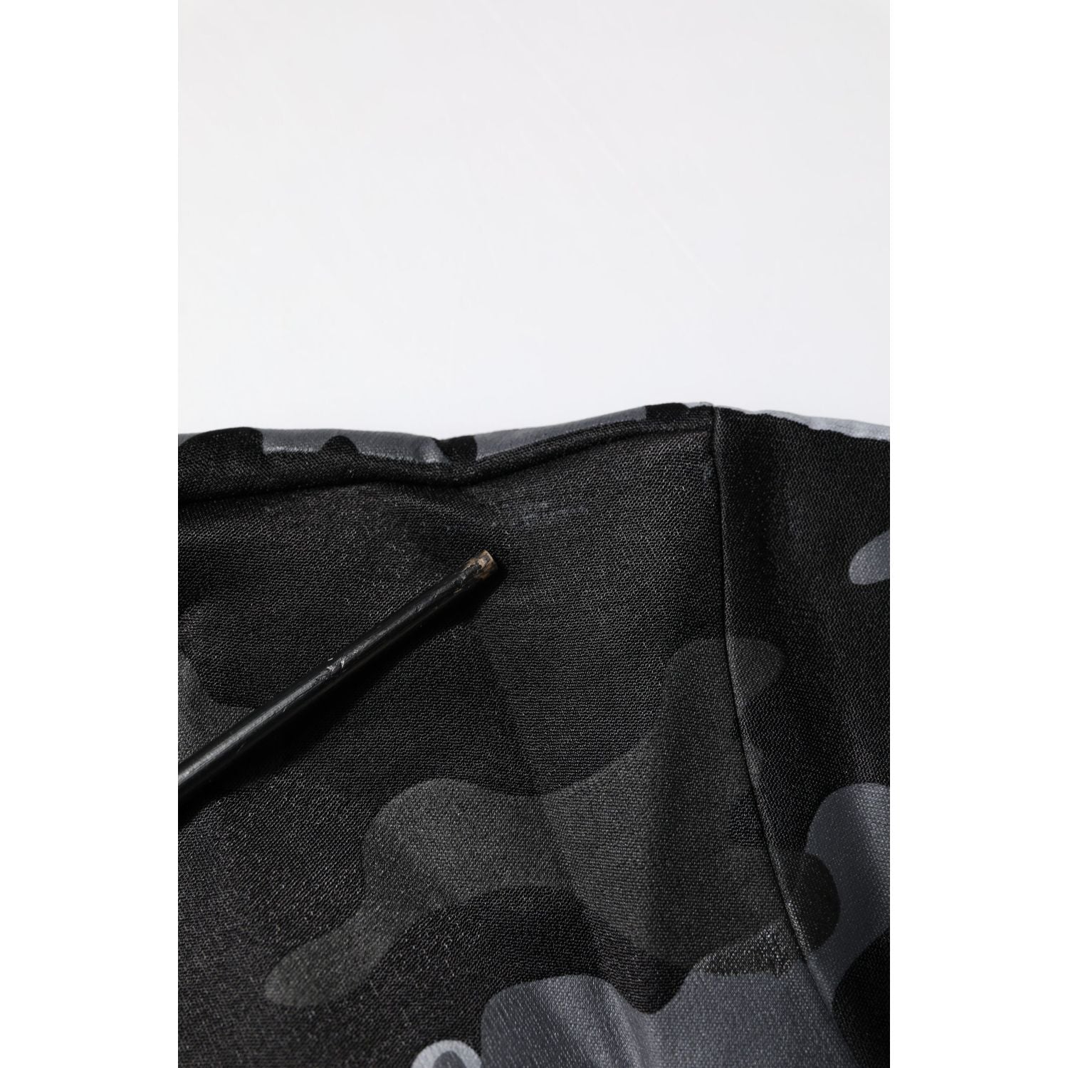 Front view with bag zipped and handles upright.