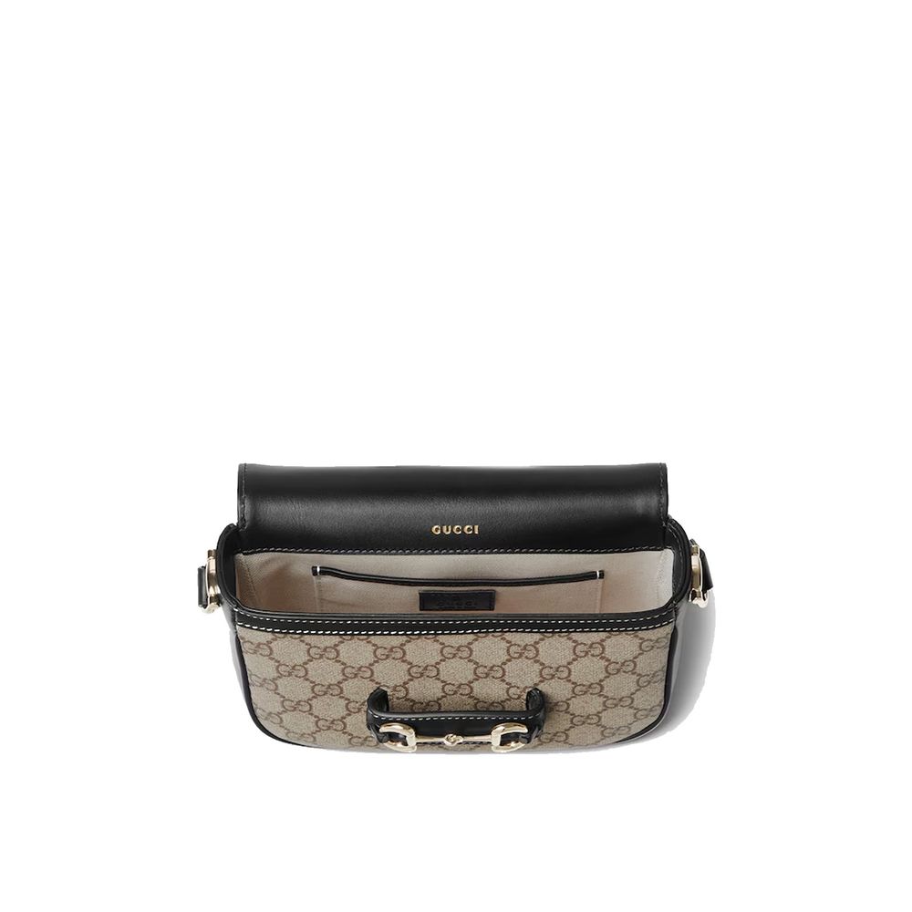 Front view with bag zipped and handles upright.